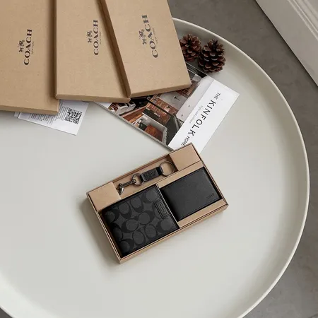 コーチ 折り財布