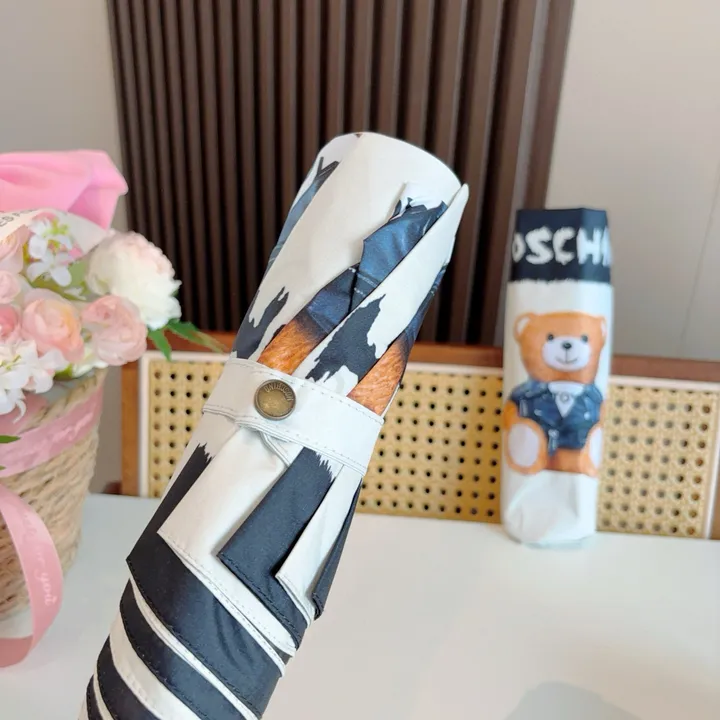 スーパーコピー カウズ 傘