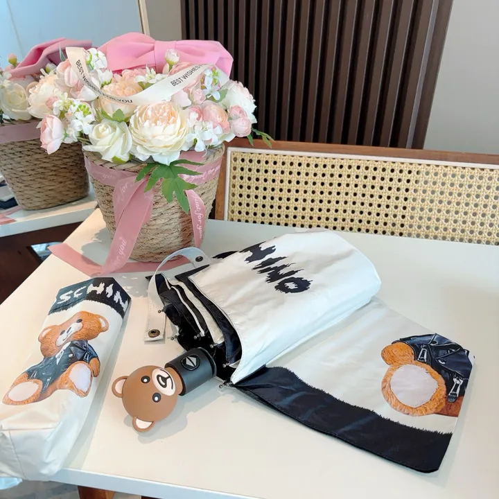 スーパーコピー カウズ 傘