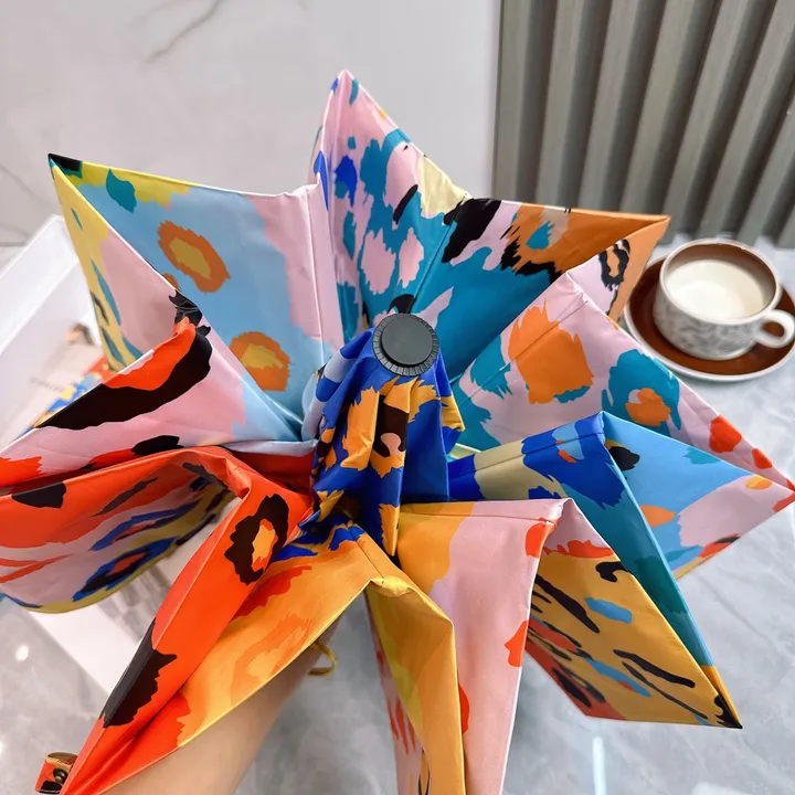 スーパーコピー カウズ 傘