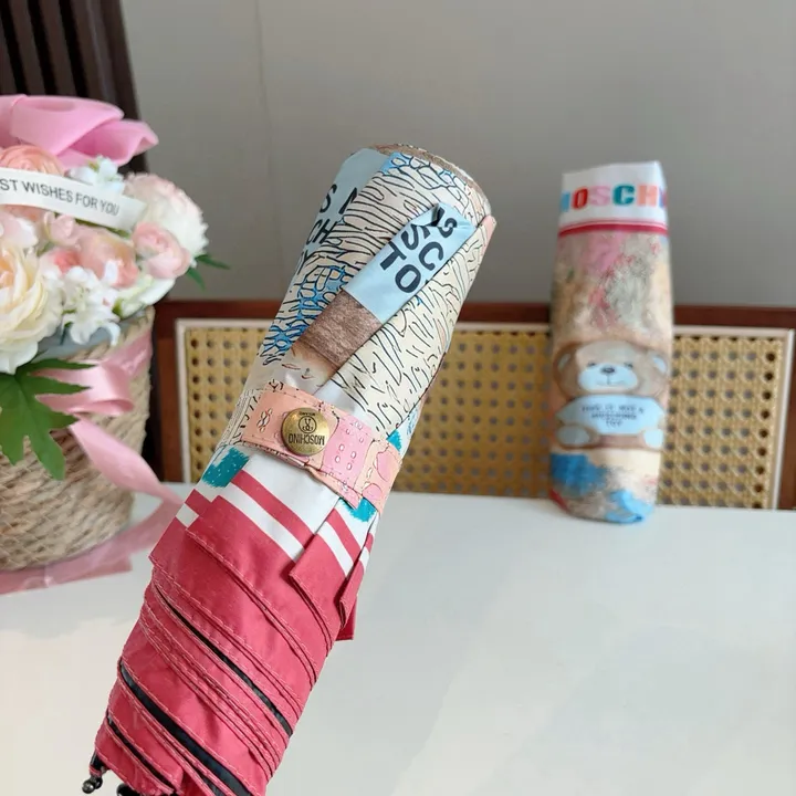 スーパーコピー カウズ 傘